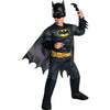 Boy wearing a padded black Batman costume with mask and cape